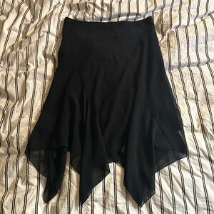 Asymmetrical sheer midi skirt in black